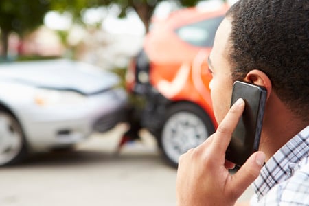 Young Man on Phone After A Car Accident | Motor Vehicle Attorney | Law Offices of P. Kent Eichelzer III