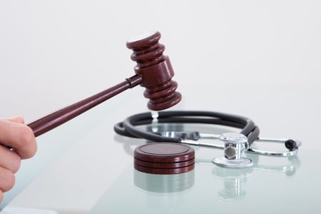 Gavel and Stethoscope | Medical Malpractice Lawsuit | Law Offices of P. Kent Eichelzer III